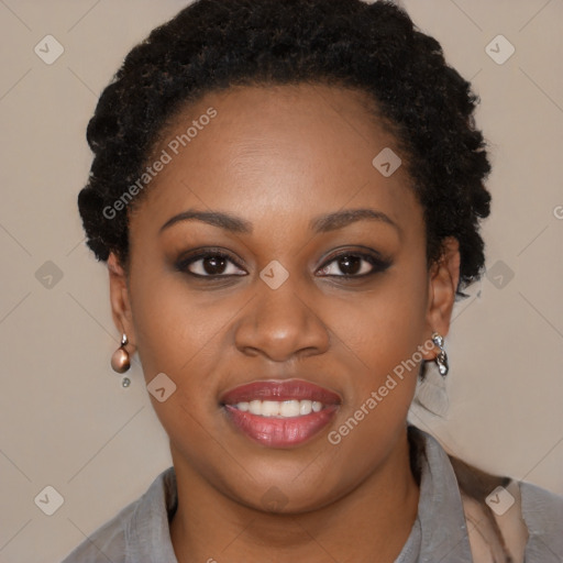 Joyful black young-adult female with short  black hair and brown eyes