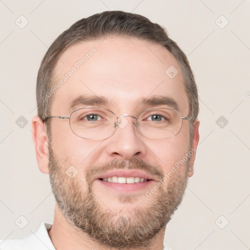 Joyful white adult male with short  brown hair and brown eyes