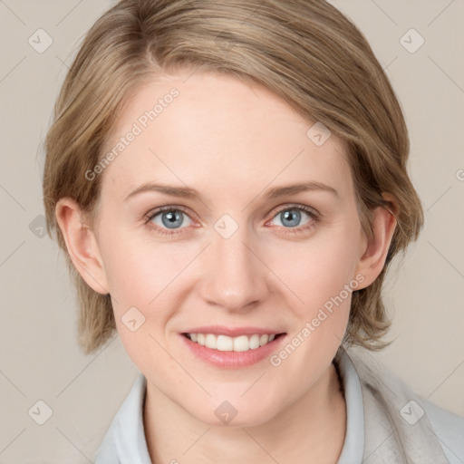 Joyful white young-adult female with medium  brown hair and blue eyes