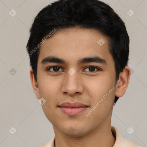 Joyful asian young-adult male with short  black hair and brown eyes