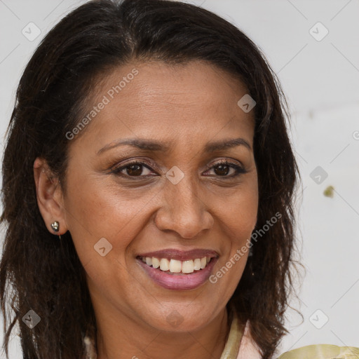 Joyful white adult female with long  brown hair and brown eyes