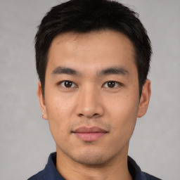 Neutral asian young-adult male with short  black hair and brown eyes