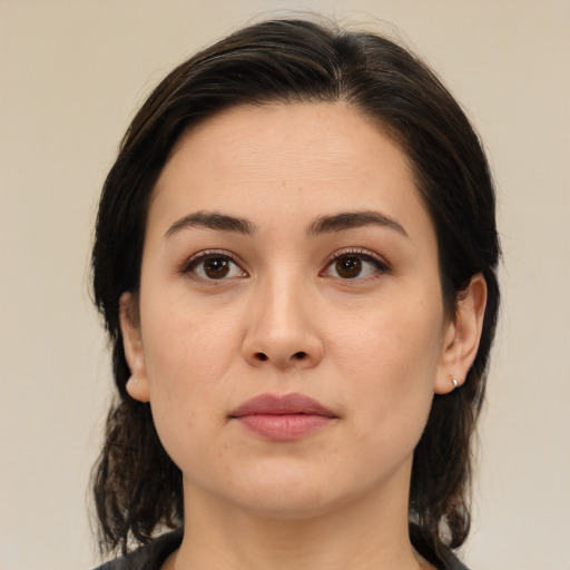 Neutral white young-adult female with medium  brown hair and brown eyes