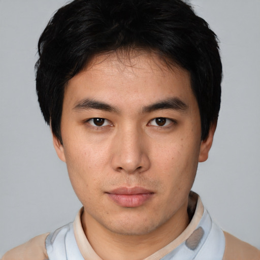 Neutral asian young-adult male with short  brown hair and brown eyes