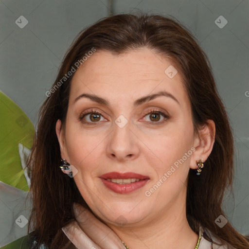 Joyful white adult female with medium  brown hair and brown eyes