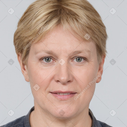 Joyful white adult female with short  brown hair and grey eyes