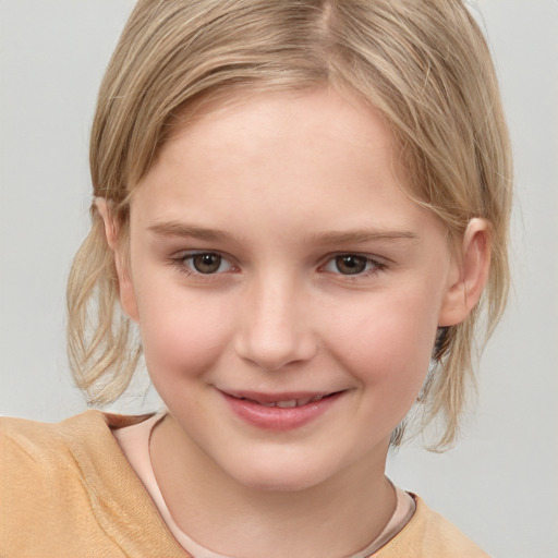 Joyful white child female with medium  brown hair and brown eyes