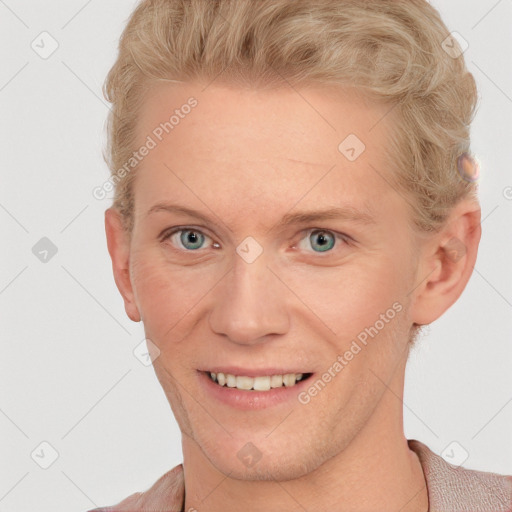 Joyful white young-adult male with short  brown hair and blue eyes