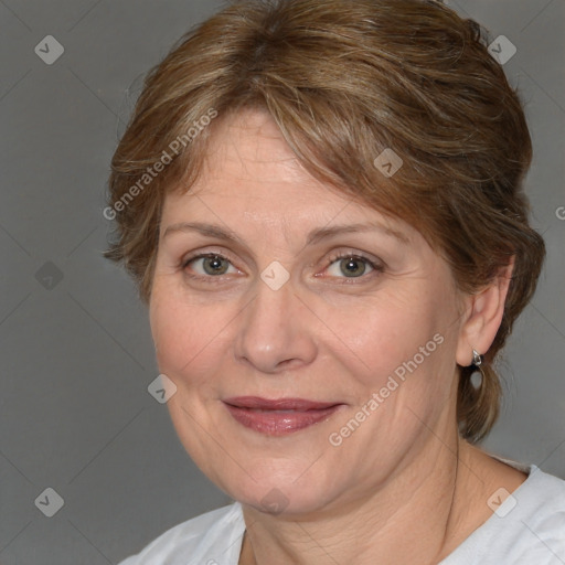 Joyful white adult female with medium  brown hair and blue eyes