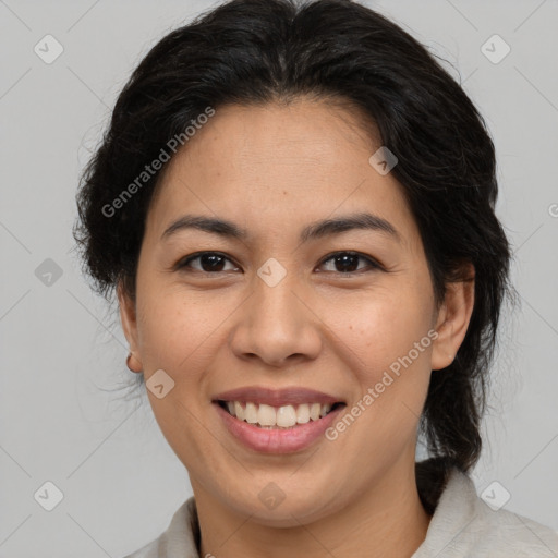 Joyful latino young-adult female with medium  brown hair and brown eyes