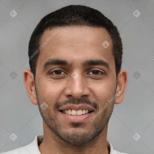 Joyful white young-adult male with short  black hair and brown eyes