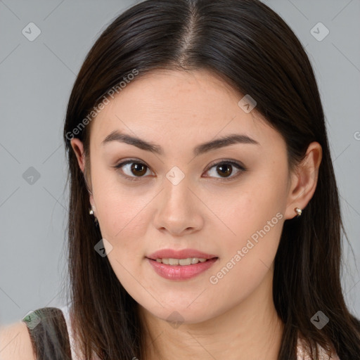 Joyful white young-adult female with long  brown hair and brown eyes