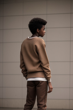 Sudanese teenager boy with  brown hair