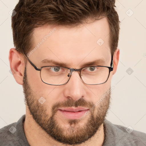 Joyful white adult male with short  brown hair and grey eyes