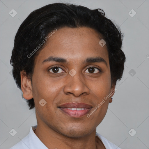 Joyful latino adult male with short  brown hair and brown eyes