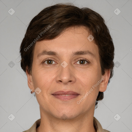 Joyful white adult male with short  brown hair and grey eyes