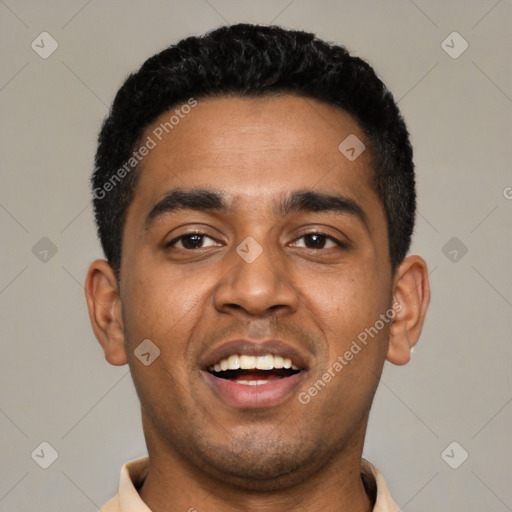 Joyful black young-adult male with short  black hair and brown eyes