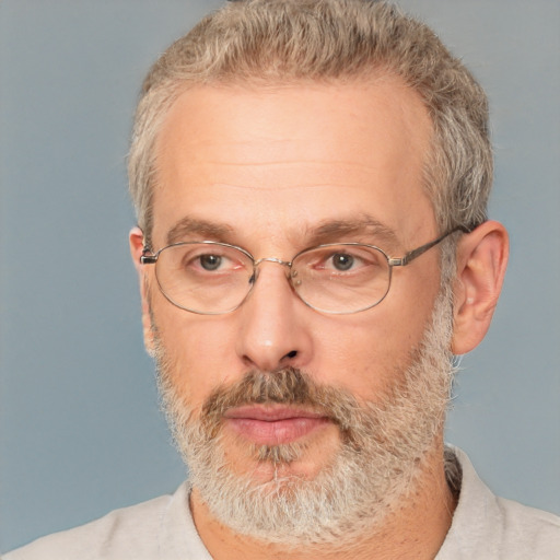 Neutral white middle-aged male with short  gray hair and brown eyes