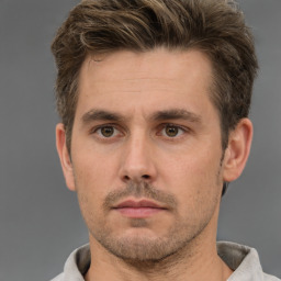 Neutral white adult male with short  brown hair and brown eyes