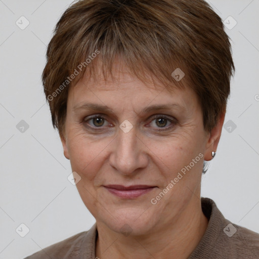 Joyful white adult female with short  brown hair and brown eyes