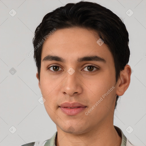 Neutral latino young-adult male with short  black hair and brown eyes