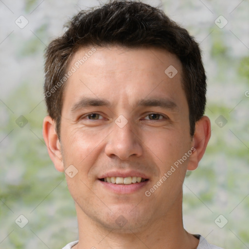 Joyful white young-adult male with short  brown hair and brown eyes