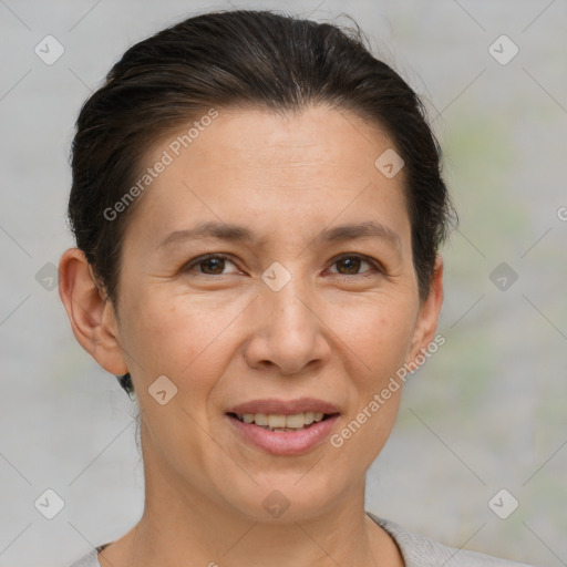 Joyful white adult female with short  brown hair and brown eyes