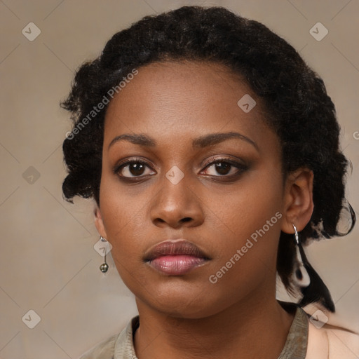 Neutral black young-adult female with medium  black hair and brown eyes