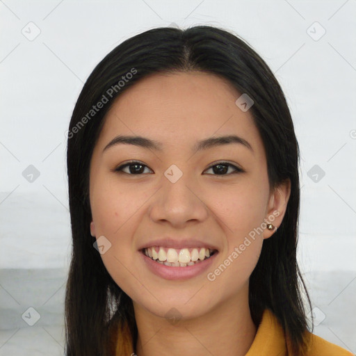 Joyful asian young-adult female with long  black hair and brown eyes