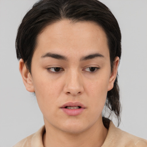Neutral asian young-adult female with medium  brown hair and brown eyes
