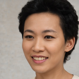 Joyful asian young-adult female with short  black hair and brown eyes