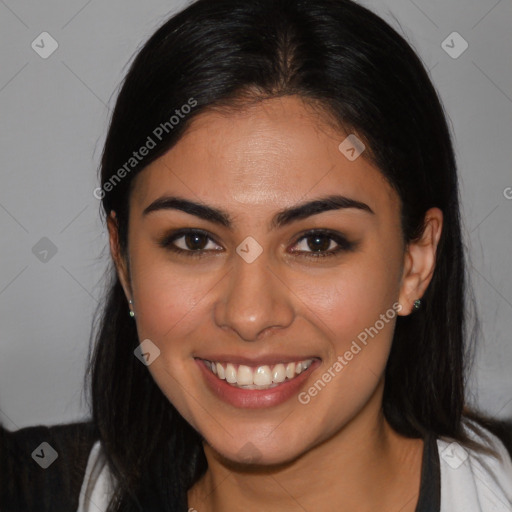 Joyful latino young-adult female with medium  brown hair and brown eyes