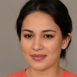 Joyful white young-adult female with medium  brown hair and brown eyes