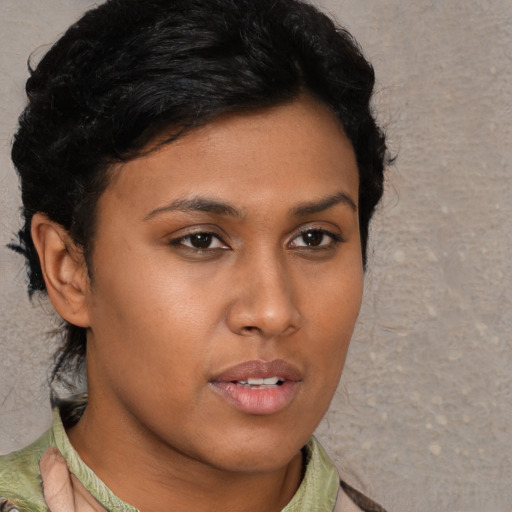 Neutral latino young-adult female with short  brown hair and brown eyes