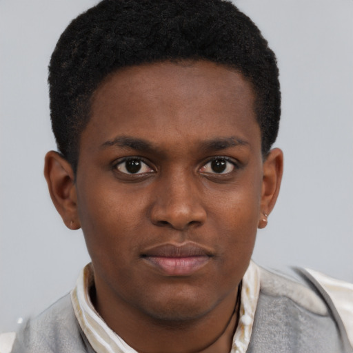 Neutral black young-adult male with short  brown hair and brown eyes