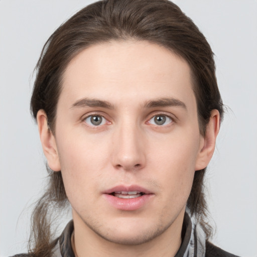 Neutral white young-adult male with medium  brown hair and brown eyes