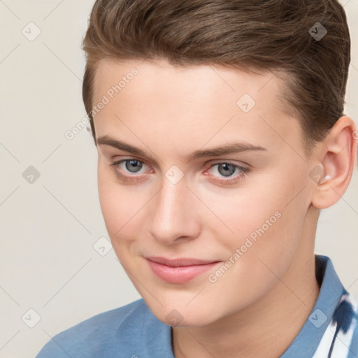 Joyful white young-adult female with short  brown hair and grey eyes