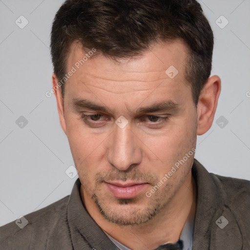 Neutral white adult male with short  brown hair and brown eyes