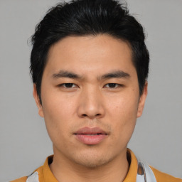 Neutral asian young-adult male with short  black hair and brown eyes