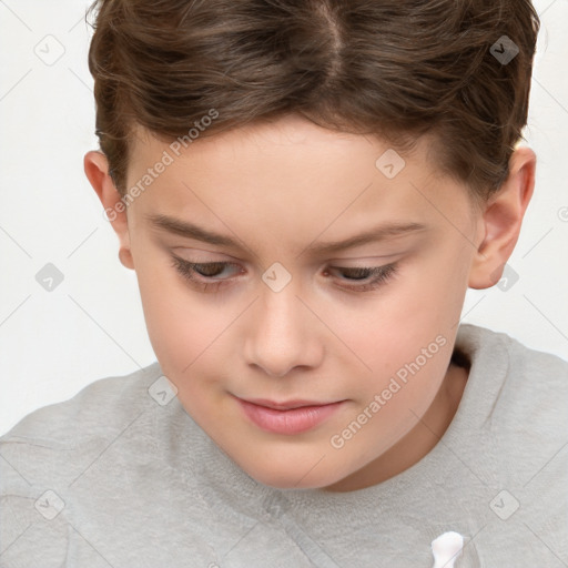 Joyful white child female with short  brown hair and brown eyes