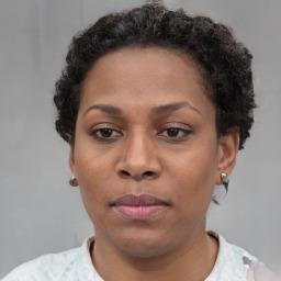 Neutral black adult female with short  brown hair and brown eyes