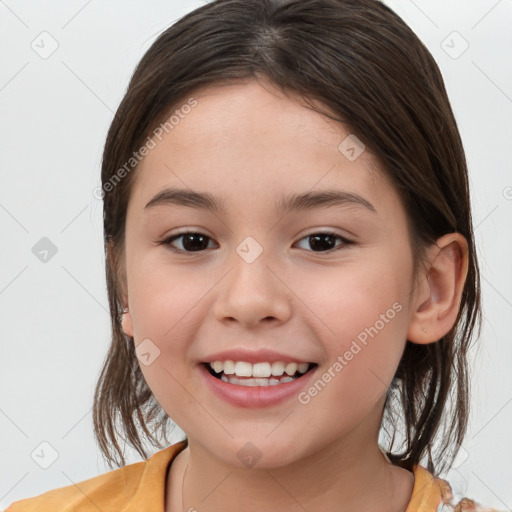 Joyful white child female with medium  brown hair and brown eyes