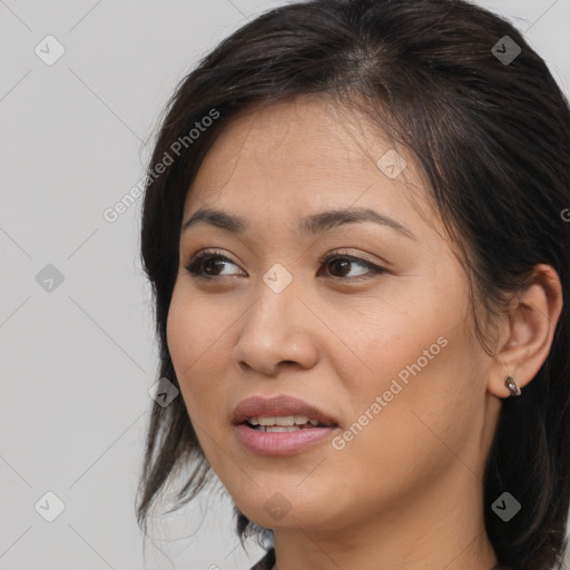 Joyful white young-adult female with medium  brown hair and brown eyes