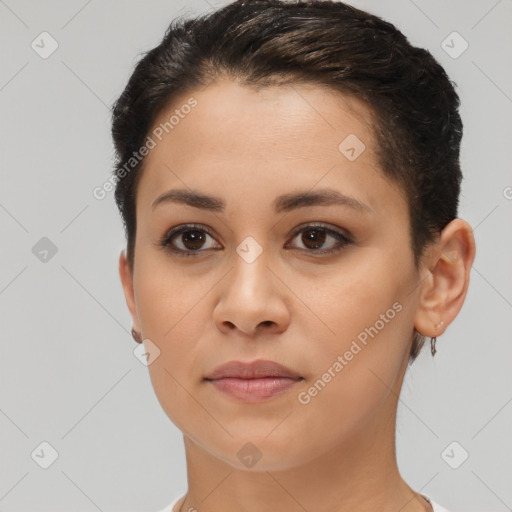 Joyful latino young-adult female with short  brown hair and brown eyes