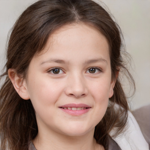 Joyful white child female with medium  brown hair and brown eyes