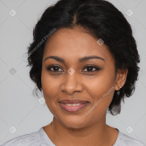 Joyful black young-adult female with medium  brown hair and brown eyes