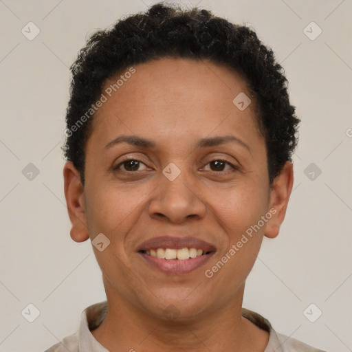 Joyful latino adult female with short  brown hair and brown eyes