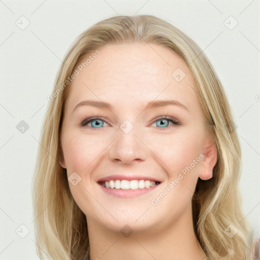 Joyful white young-adult female with long  brown hair and blue eyes