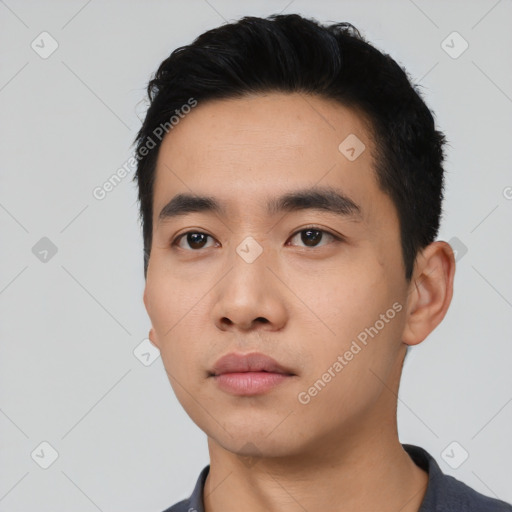 Neutral asian young-adult male with short  black hair and brown eyes