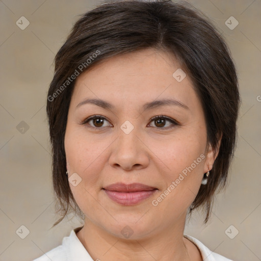 Joyful white adult female with medium  brown hair and brown eyes